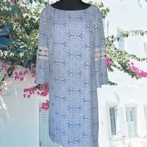 Luxology white medallion print on sky blue open crochet detail on sleeve